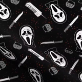 A closeup of the ghostface fabric. The fabric is a dark grey background with red blood splatters, the ghostface mask, a 90s wireless house phone, a voice changer and a knife.