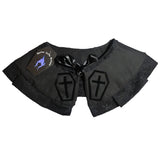 Coffin Love Collar: A detachable collar in a gothic style associated with lolita goth, victorian goth and romantic goth. Black cotton with black lace trimming and black ribbon tie up detail, with a velvet transfer of coffins with crosses inside. The perfect valentines gift for a gothic lover