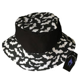 A summer goth hat with a black and white bat fabric. A reversible design with two wearing options. Suitable for a goth summer party, a goth beach hat, or a goth Easter party. The fabric is black and white bats in various sizes flying around.