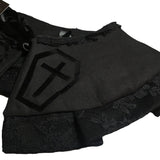 A detachable collar in a gothic style associated with lolita goth, Victorian goth and romantic goth. Black cotton with black lace trimming and black ribbon tie up detail, with a velvet transfer of coffins with crosses inside. 